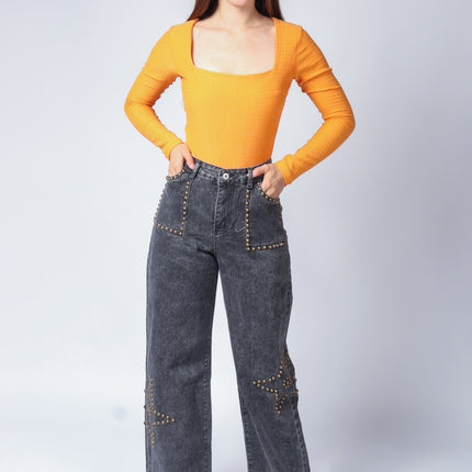 Pantalón de mezclilla con estoperol.